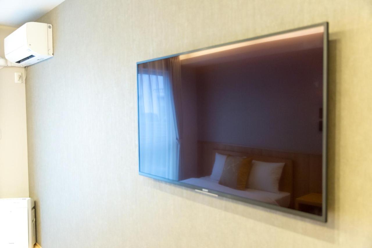 Grand Base Hiroshima Hikarimachi Aparthotel Exteriör bild