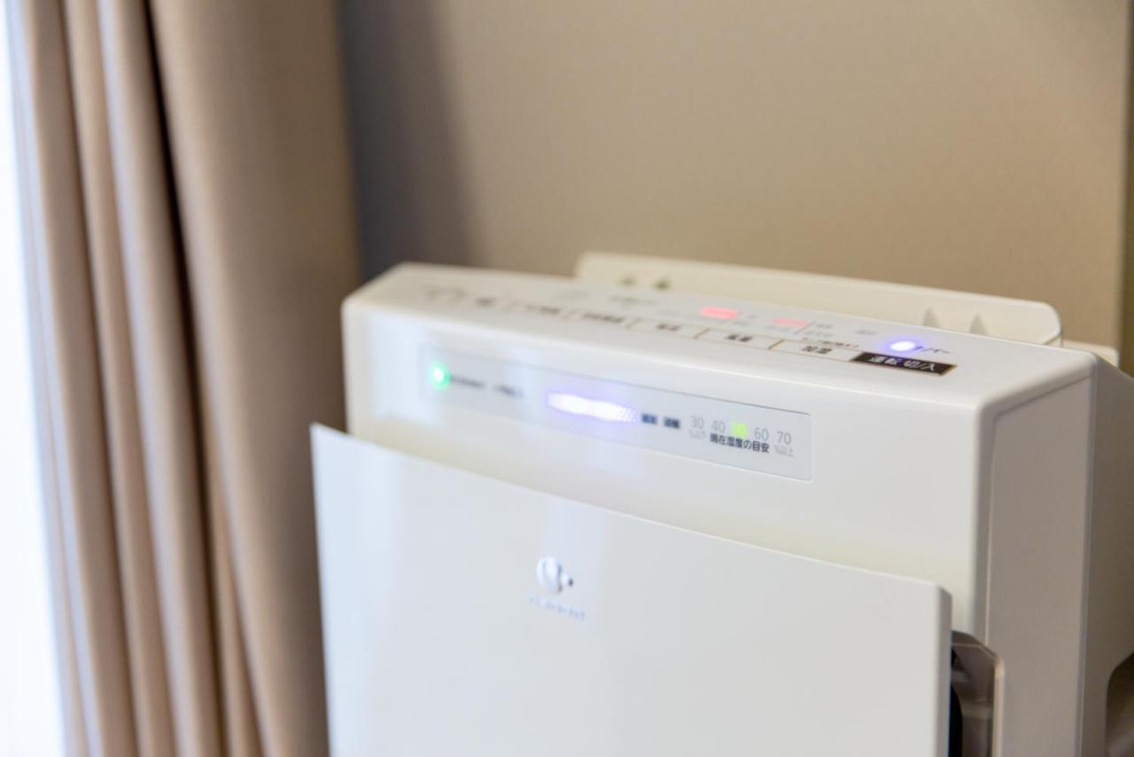 Grand Base Hiroshima Hikarimachi Aparthotel Exteriör bild