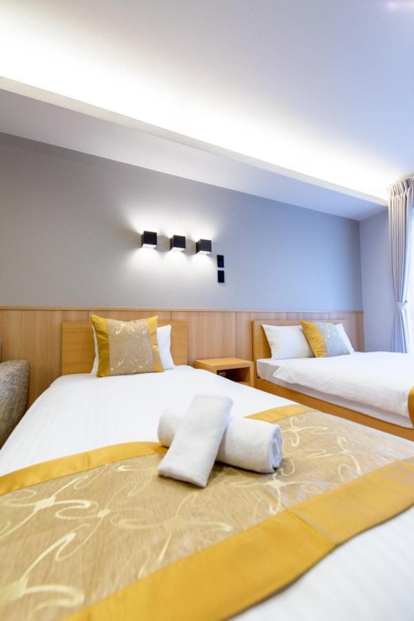 Grand Base Hiroshima Hikarimachi Aparthotel Exteriör bild