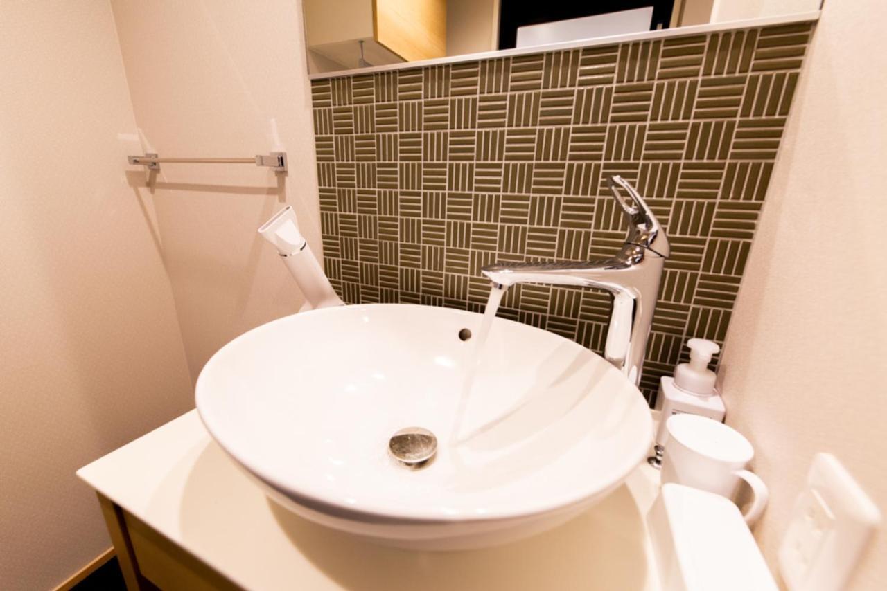 Grand Base Hiroshima Hikarimachi Aparthotel Exteriör bild