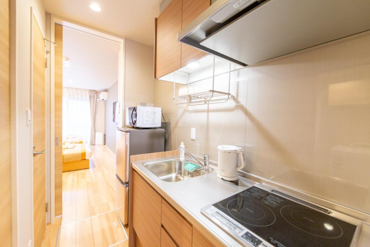 Grand Base Hiroshima Hikarimachi Aparthotel Exteriör bild